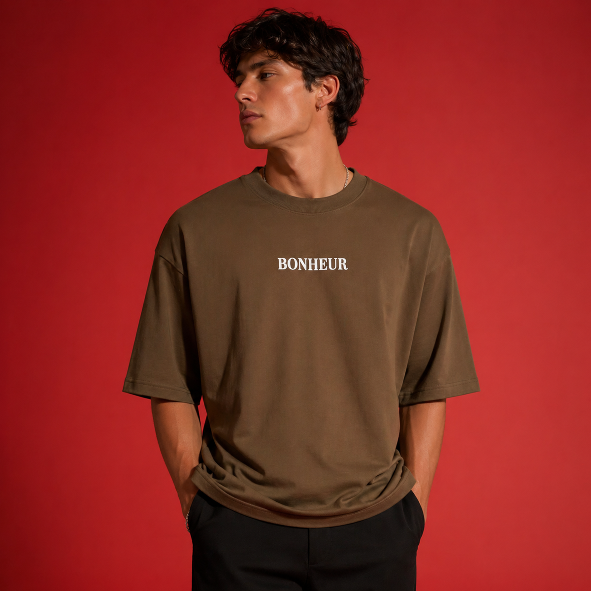 Unisex oversized T-shirt by Bonheur, 240GSM, in soft fabric, shown laid flat with a relaxed fit and classic crew neckline.